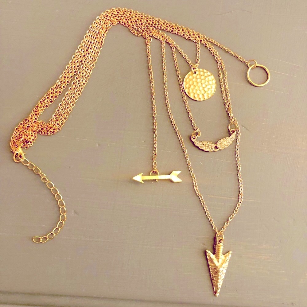 Multi strand gold necklace w charms